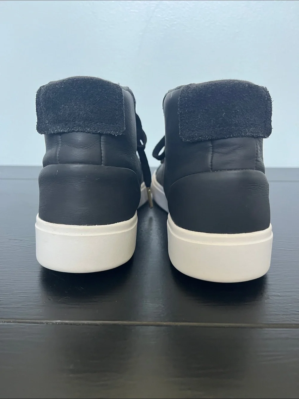 Adidas W/7.5 Black High-Top Sneakers/ white sole and gold logo.